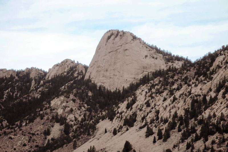 The Tooth of Time, a granite peak rising above forested slopes at Philmont Scout Ranch